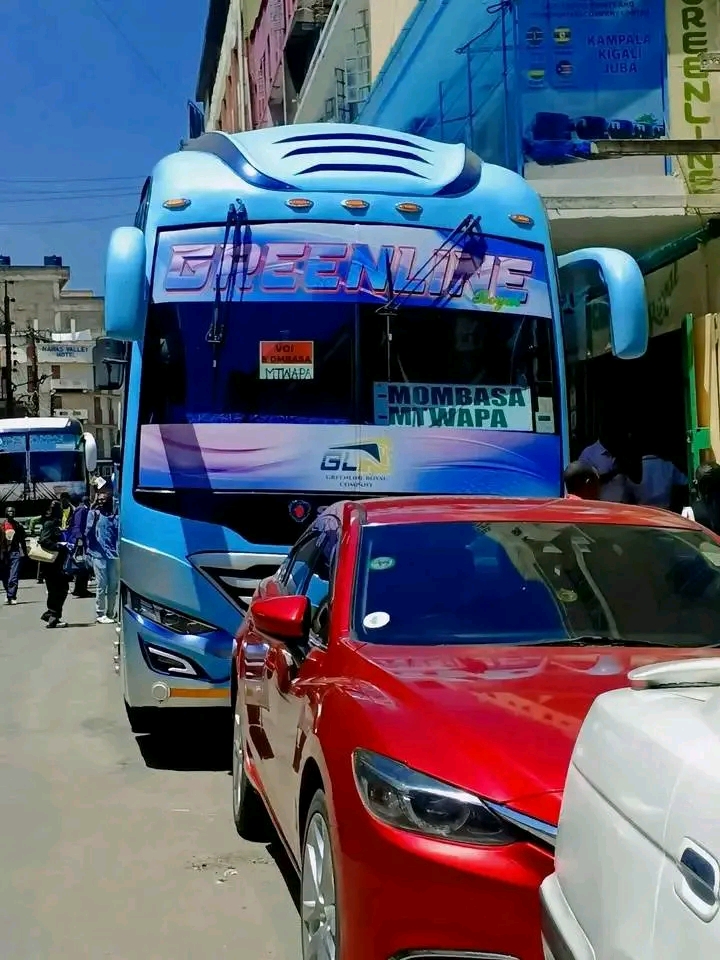 Greenline Royal sky-blue executive bus at the city terminal