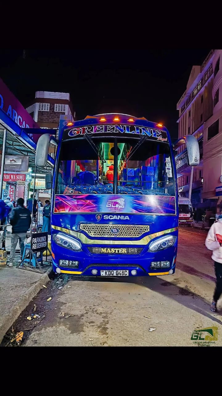 Greenline Royal Express Scania Master coach at night in Nairobi CBD