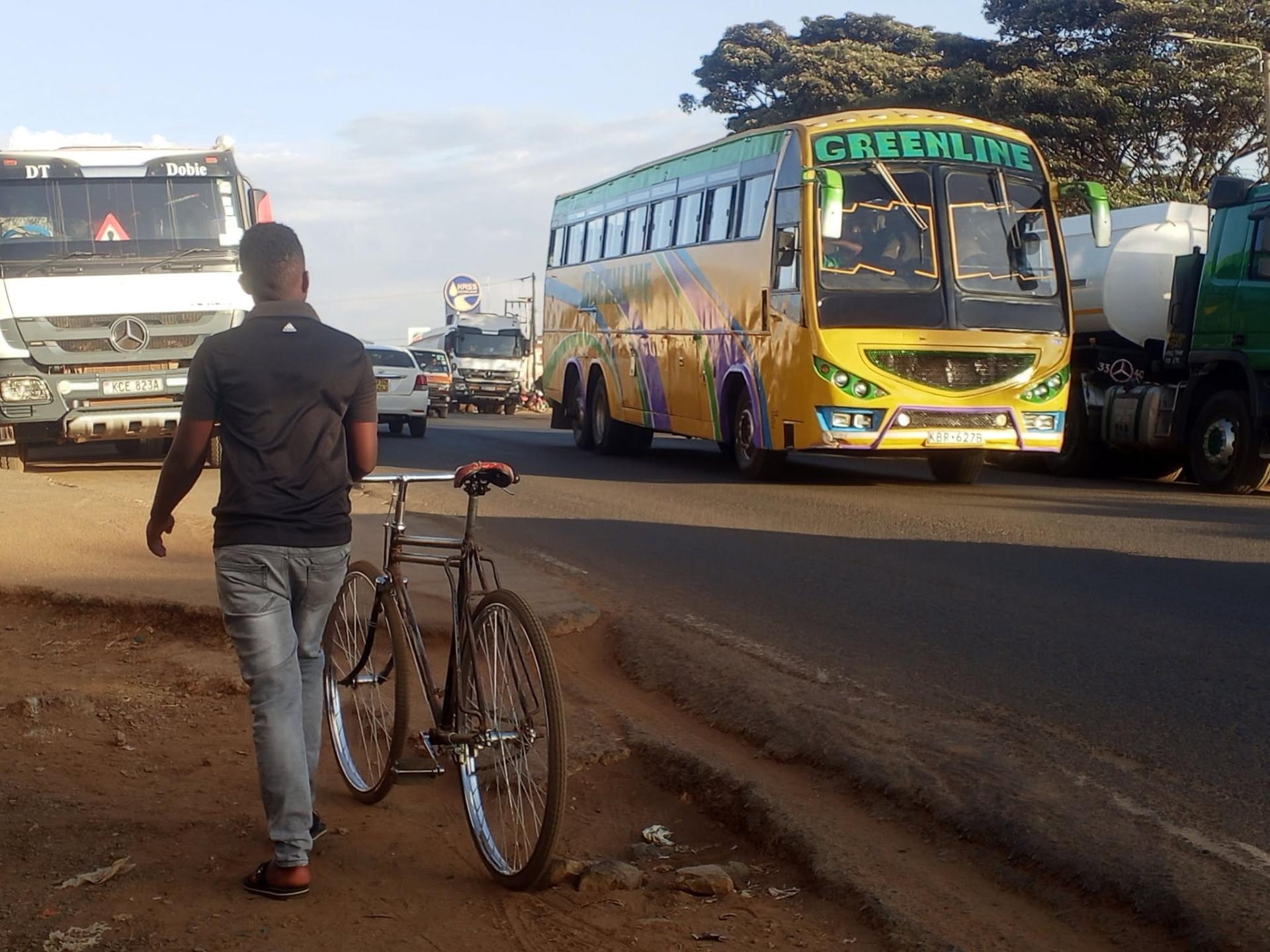 Greenline Royal coach passing through highway interchange